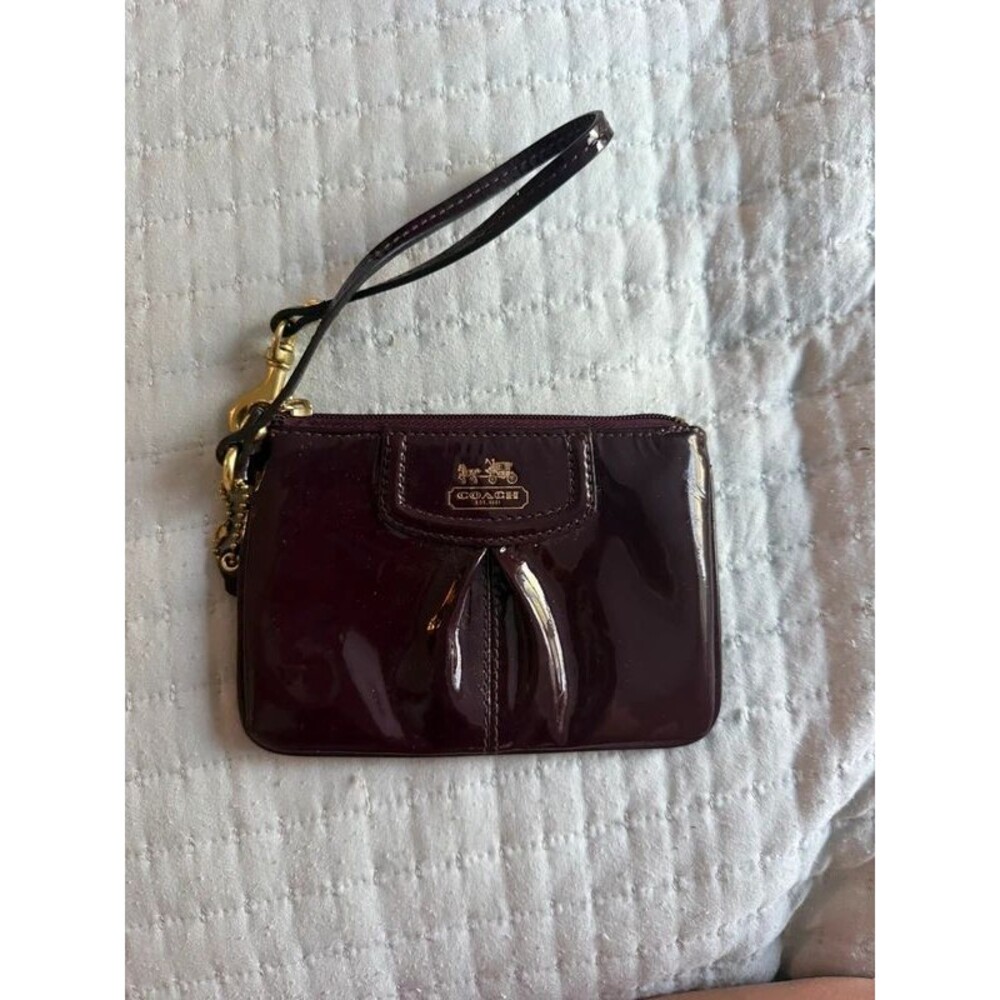 Coach burgundy wristlet